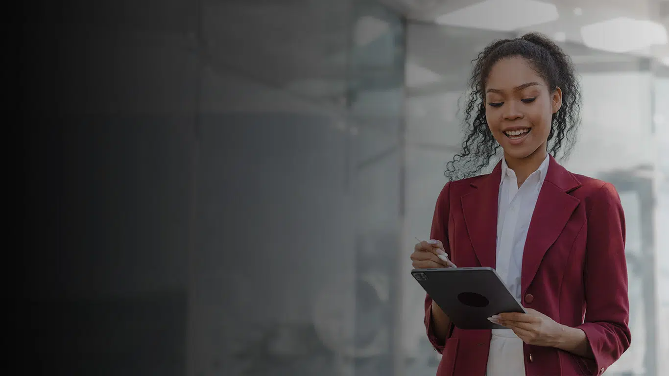 Woman on Tablet Accessing the Honeywell Life Sciences Applications Suite